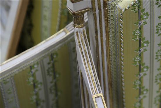 A suite of George III white and gilt seat furniture, comprising five armchairs and a settee, W.6ft 6in.